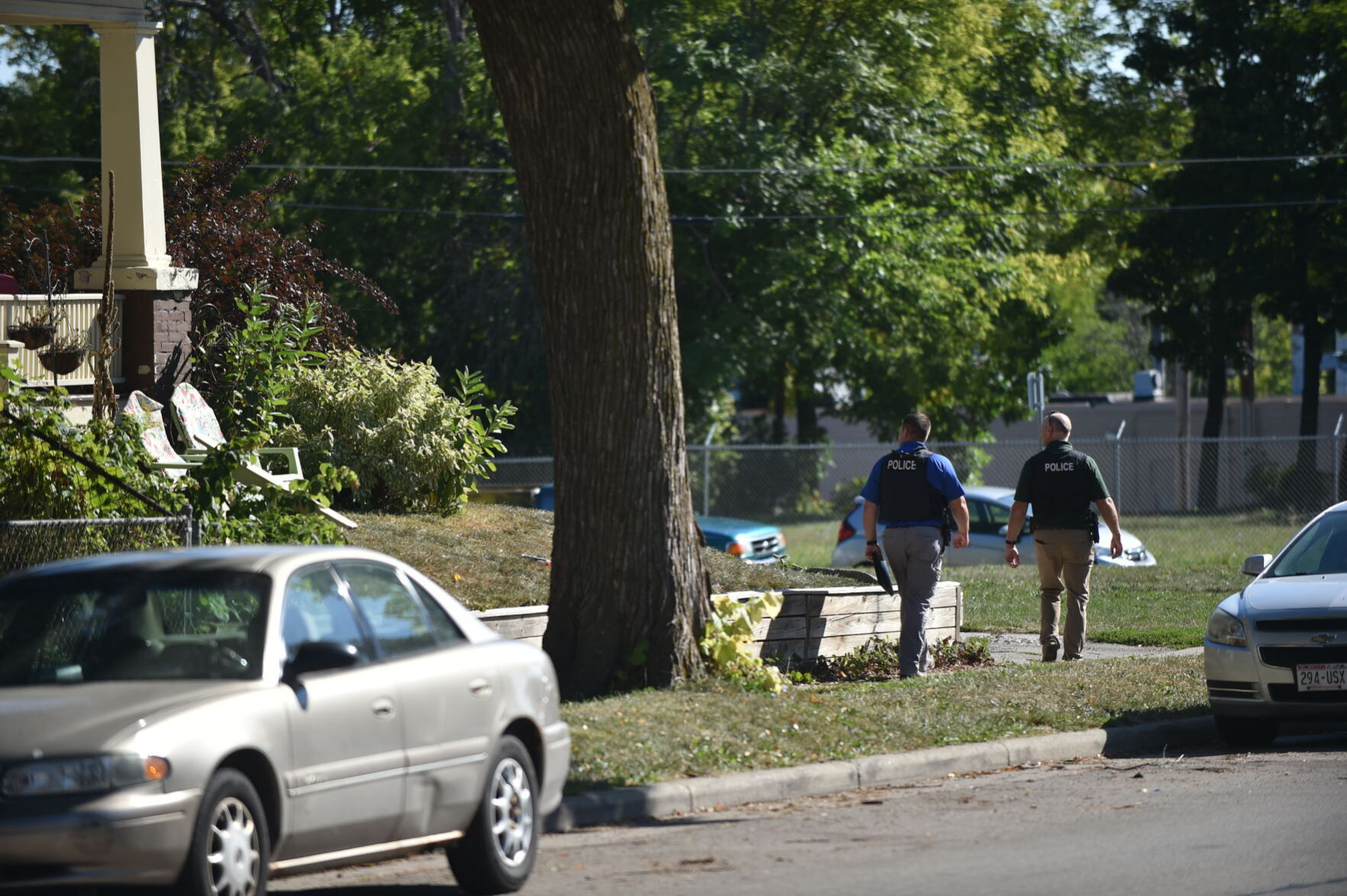 From scene of triple shooting on Racine Street, as of Monday morning